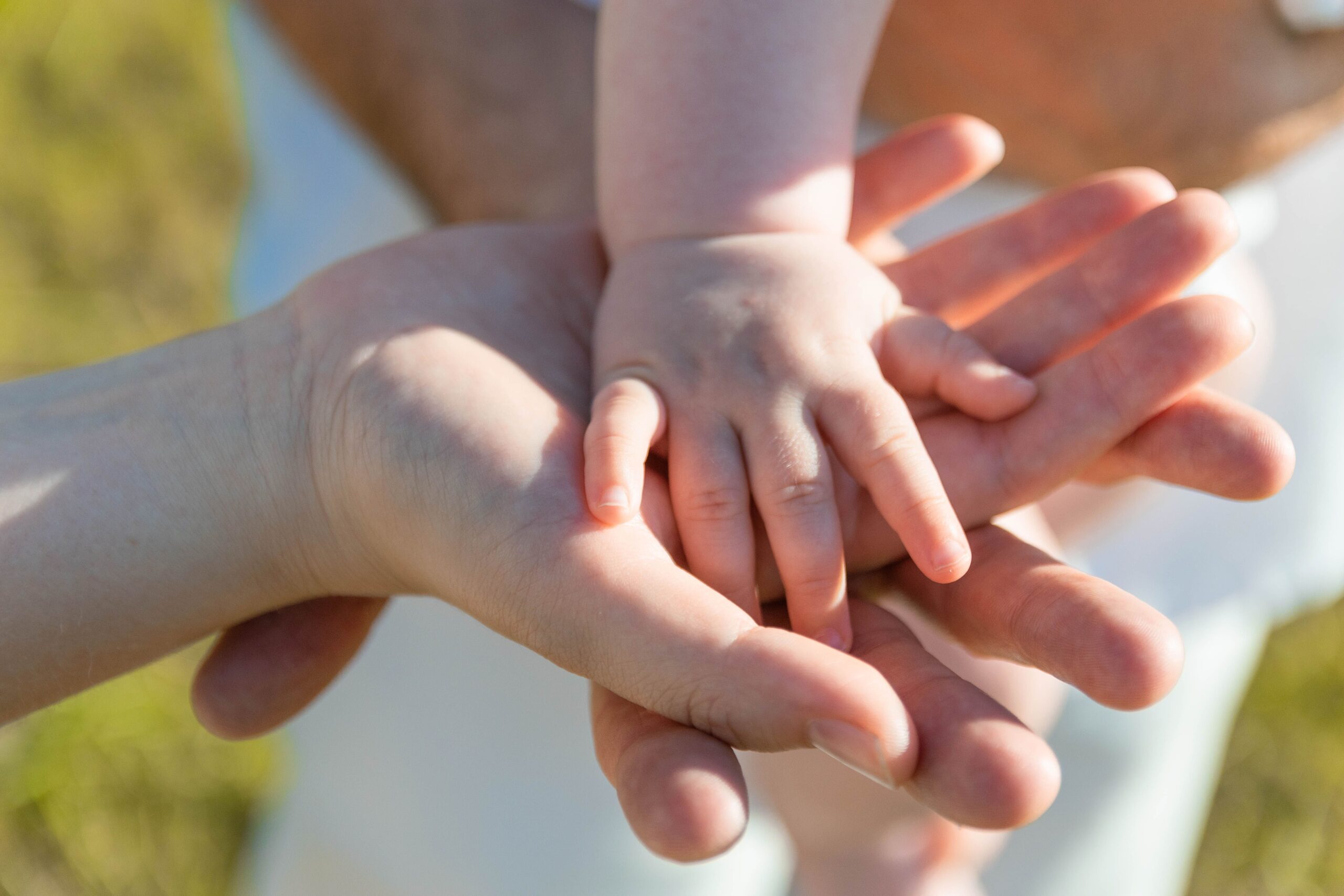 three hands together